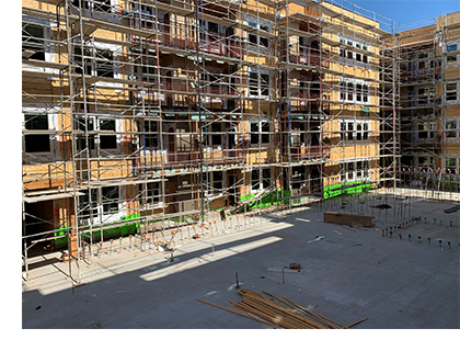 View of Las Ventanas under construction from interior courtyard